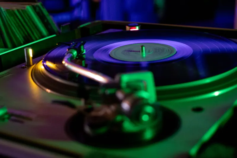 Wax On, Stream On: Why Bedroom Producers Are Pressing Vinyl in 2025 and What It's Actually Doing for Their Careers